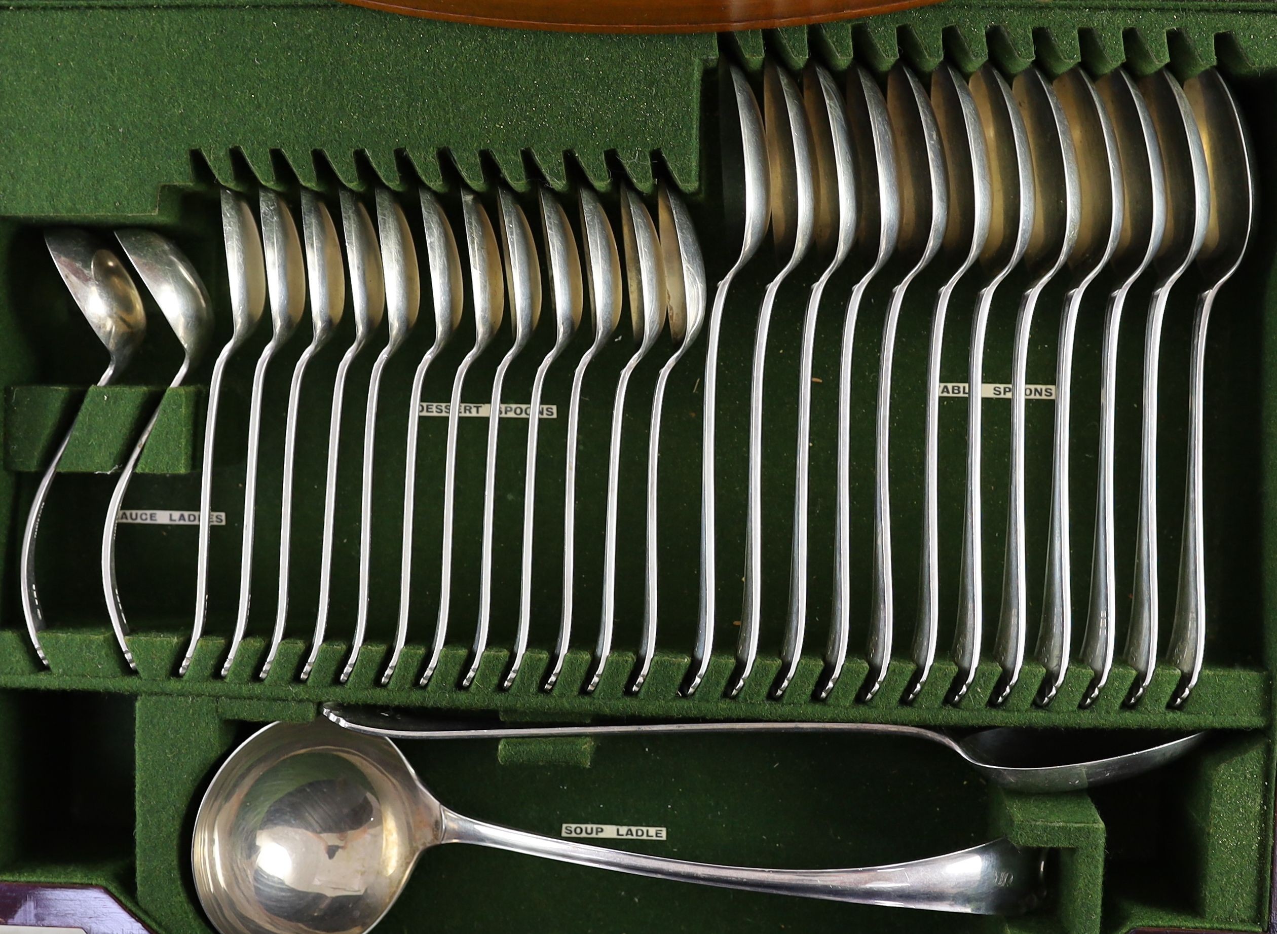 A George V canteen of silver cutlery by Atkin Brothers